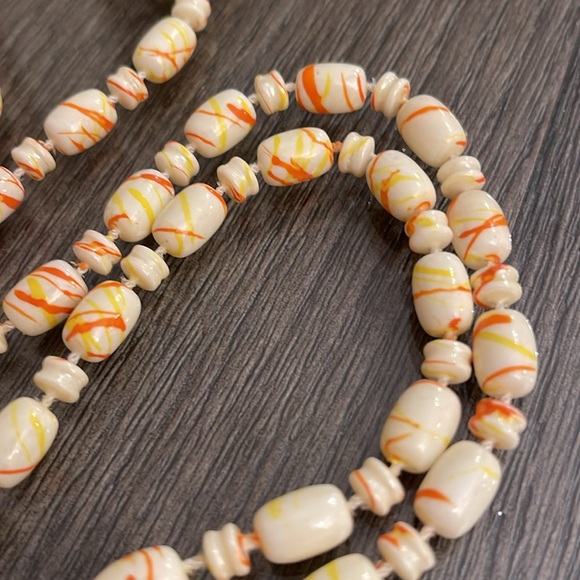 Vintage Beaded Necklace Ivory with Orange and Yellow Paint Splatter Design - Picture 4 of 13